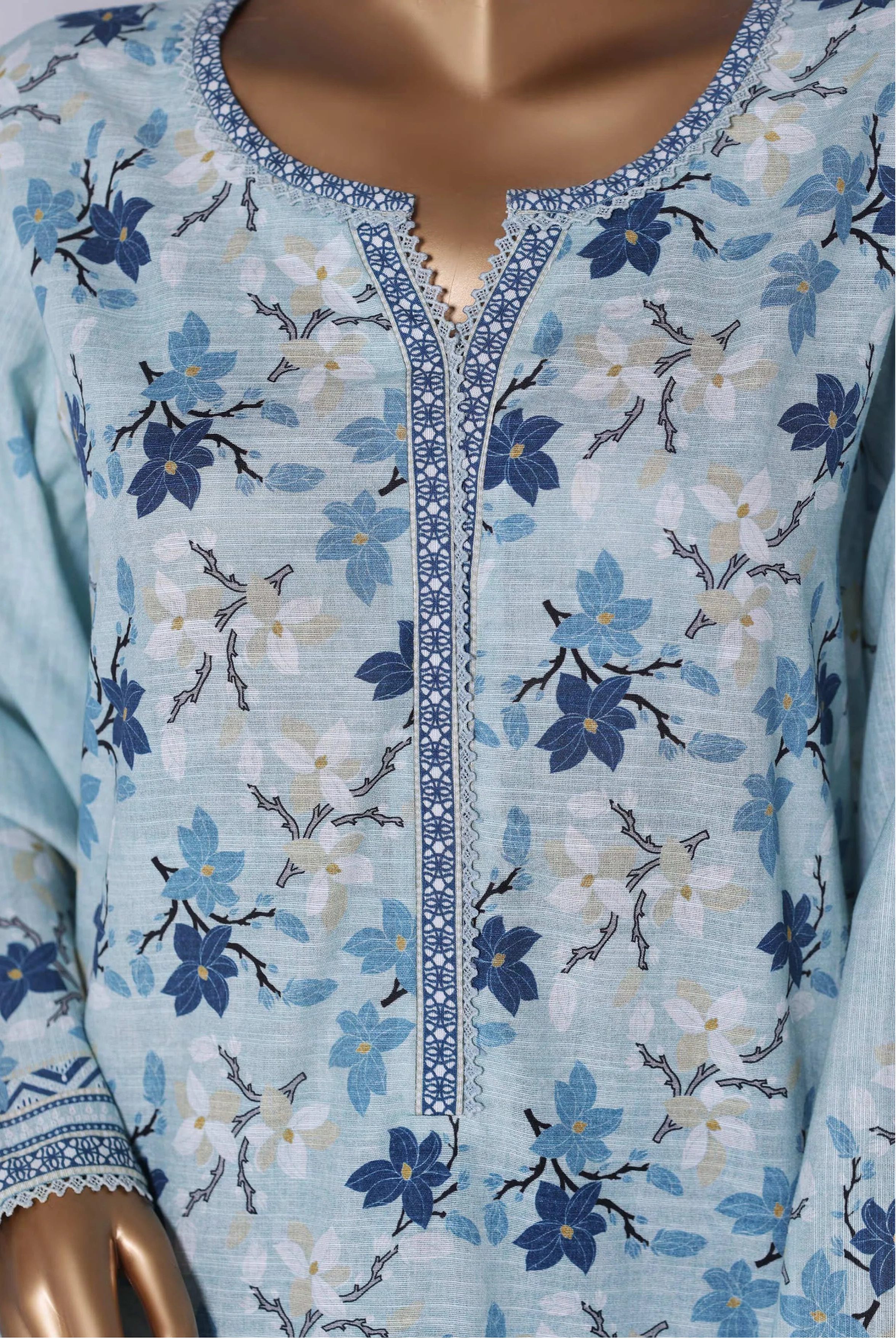 Blue and white floral embroidered outfit close Up with 'BIN SAEEED' branding.