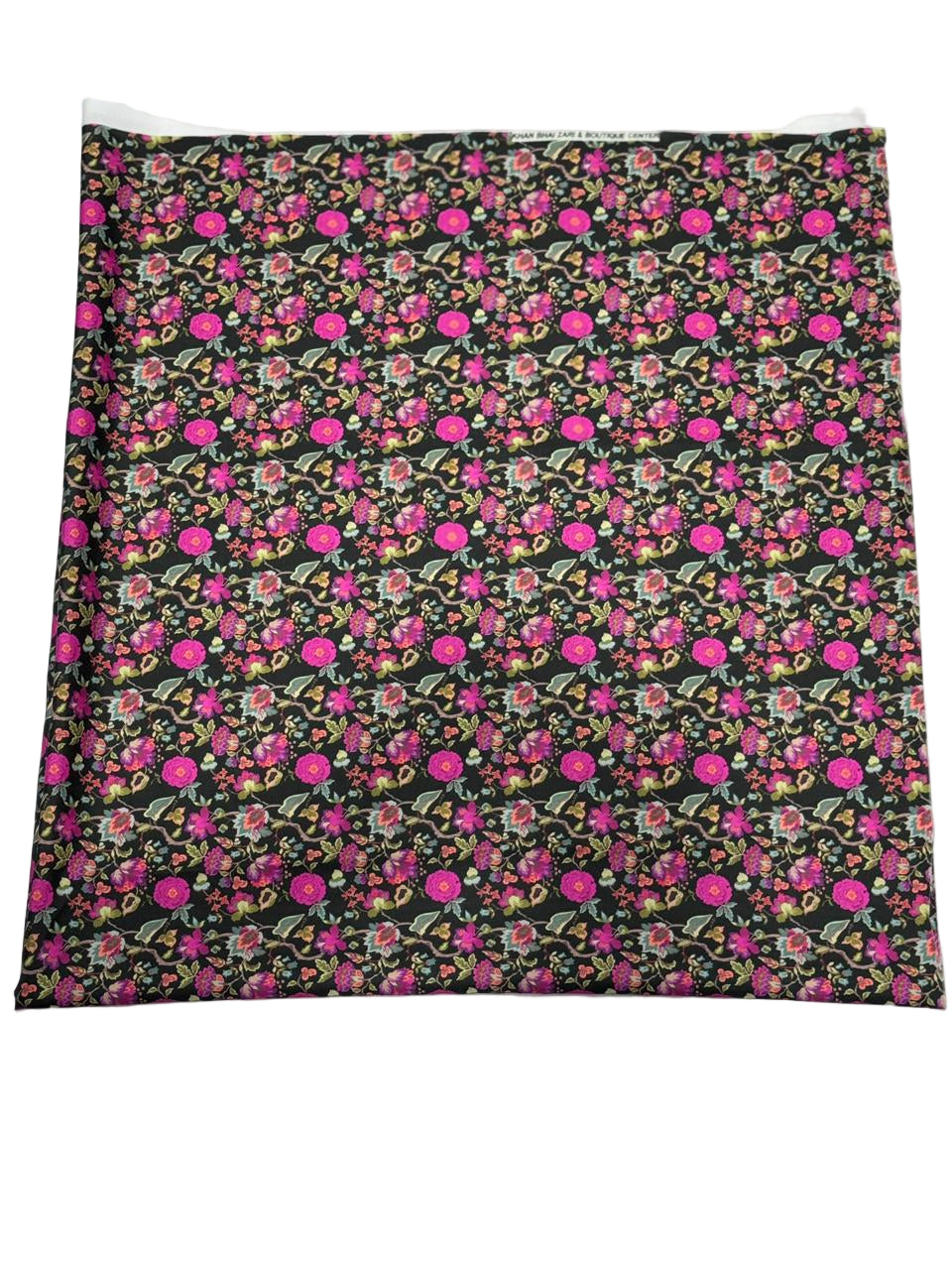 Floral patterned fabric with pink flowers on a white background