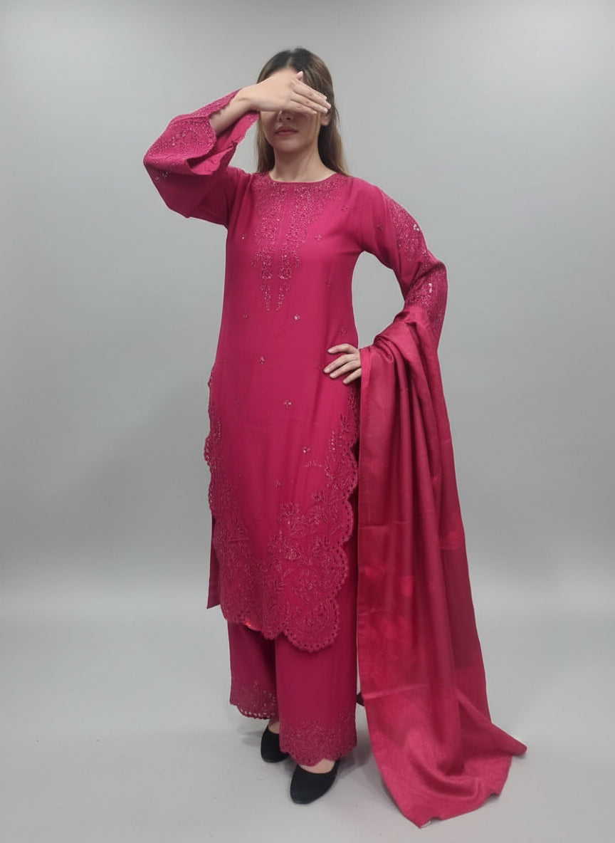 A Girl wearing a pink traditional outfit with a green background