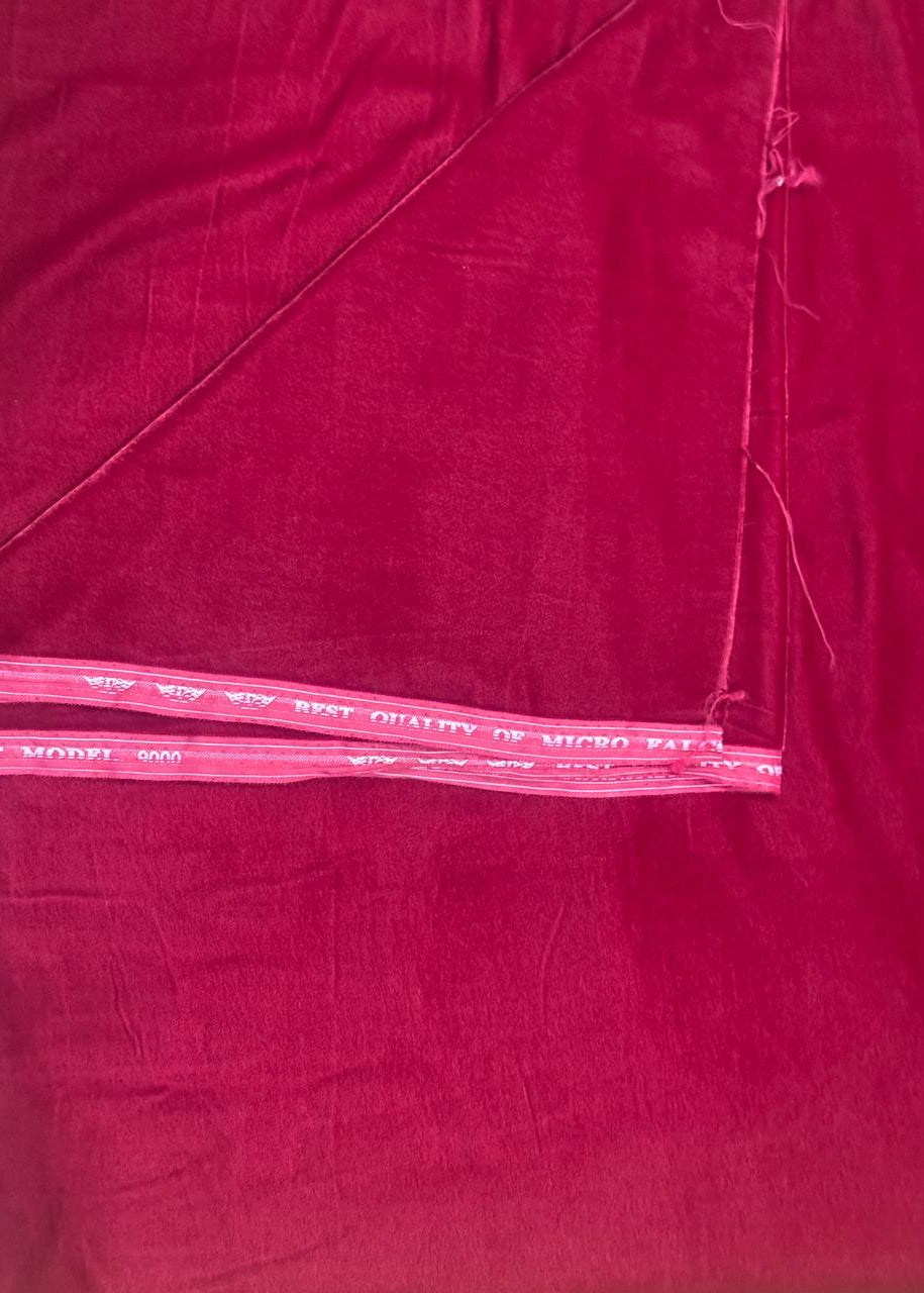 Close-up of red fabric with a clear plastic strip
