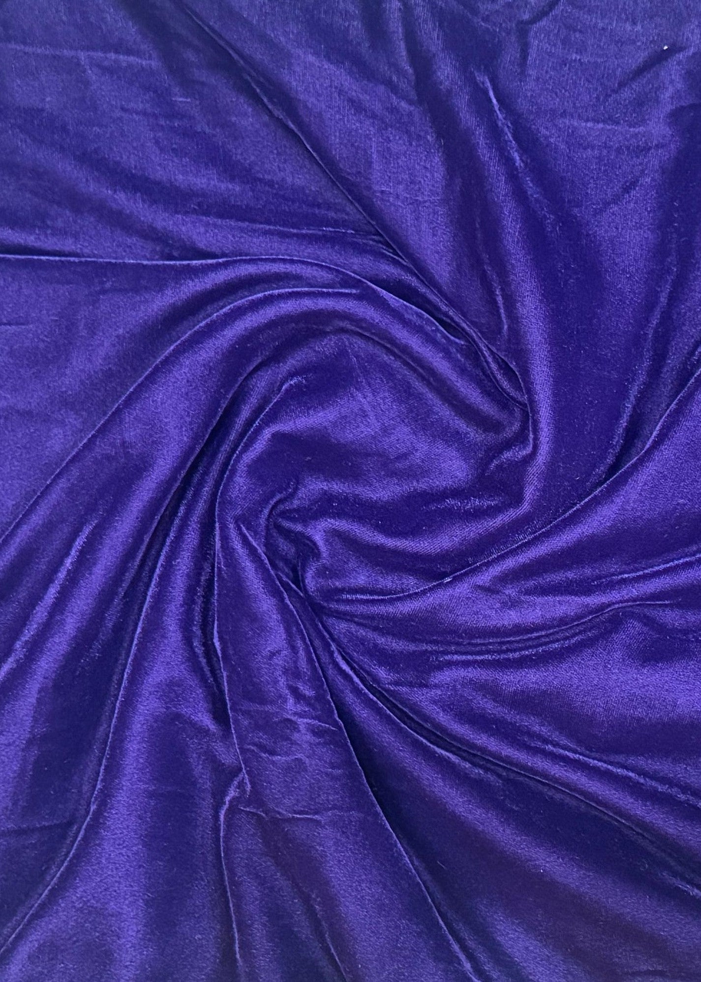 Close-up of purple fabric with folds