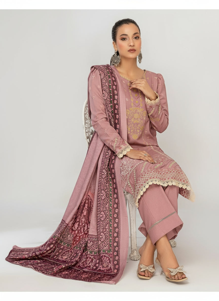 Woman in a traditional outfit sitting next to a table with a red cloth on a white background