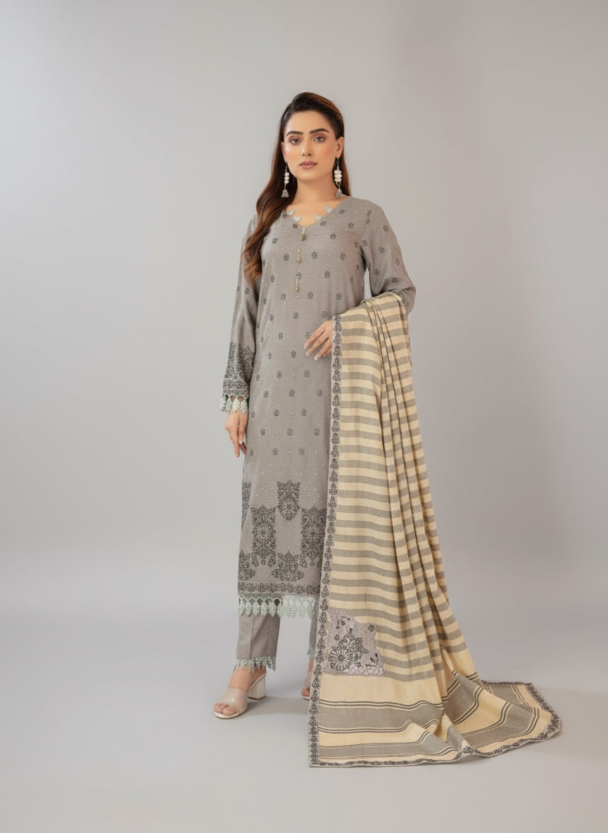 A beautiful Model with the pretty dress posing in a Studio Room.