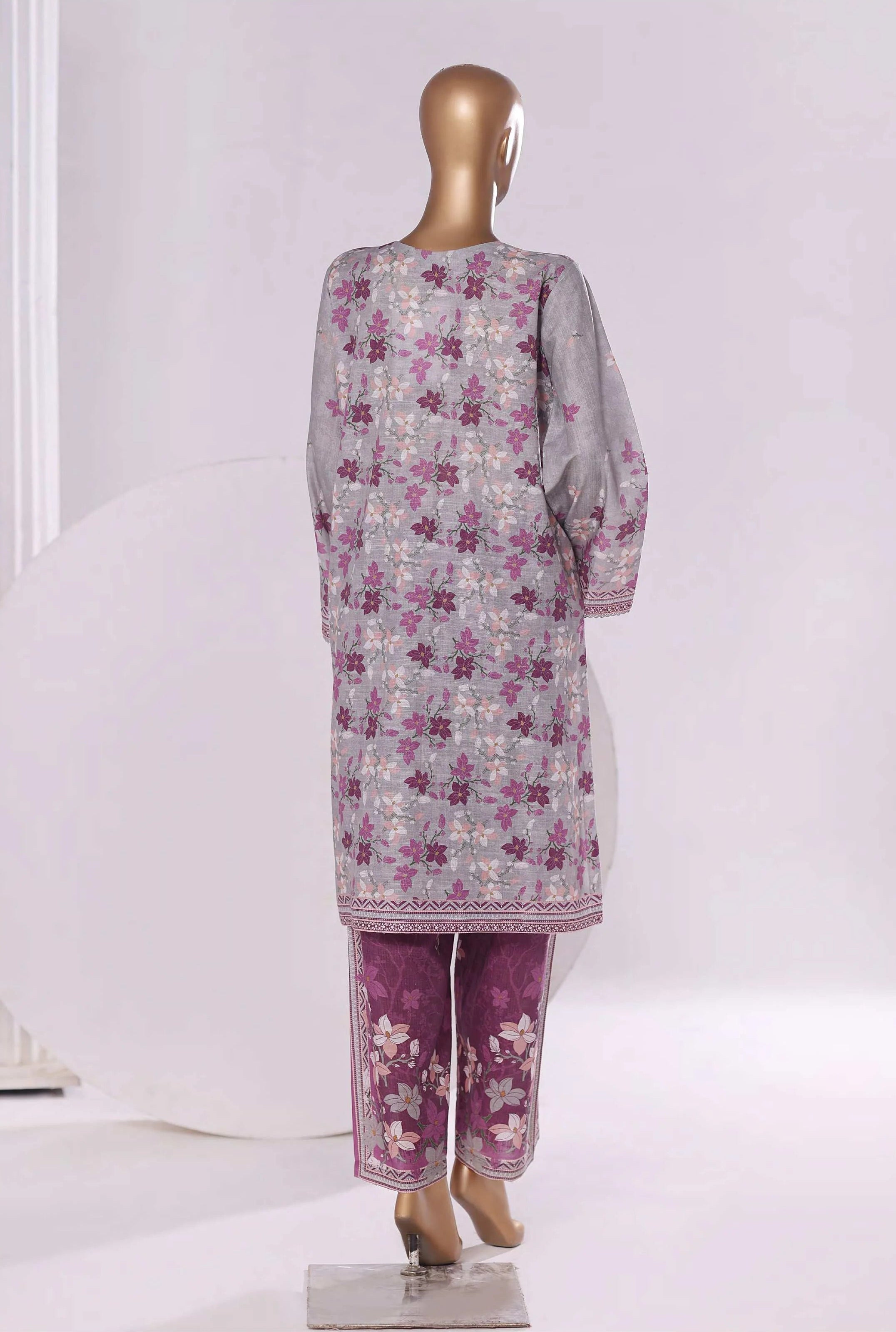 Floral patterned outfit on a mannequin against a white background