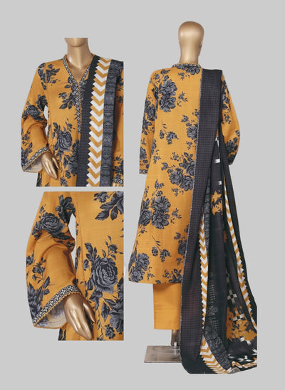Yellow floral dress with black dupatta on a mannequin against a decorative background