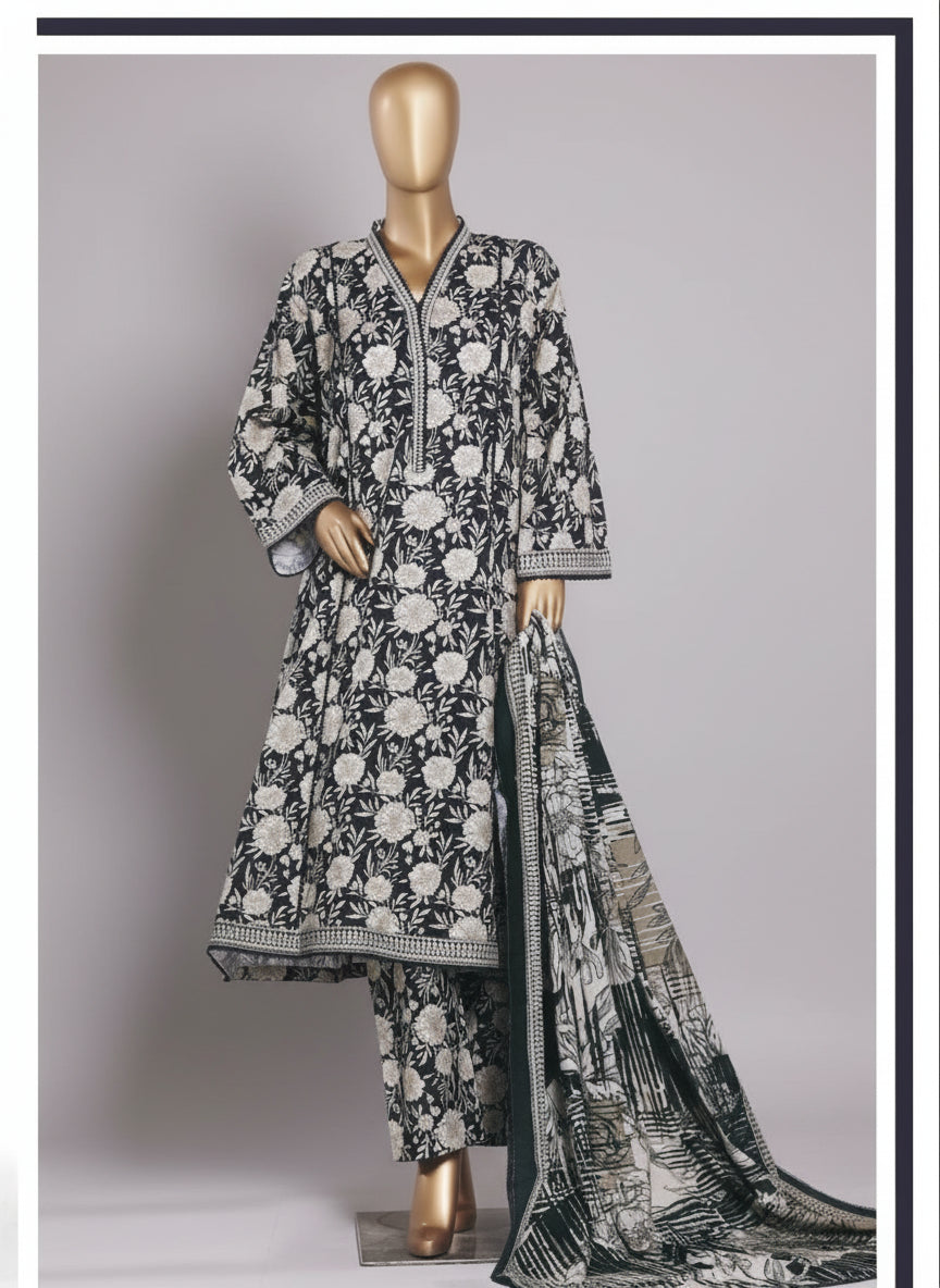 Black and white floral dress on a mannequin with a blue chair in the background