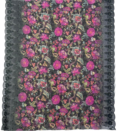 Floral lace fabric with pink and green flowers on a white background