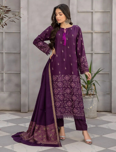 Woman wearing a purple embroidered outfit with a close-up of the fabric, set against a neutral background.