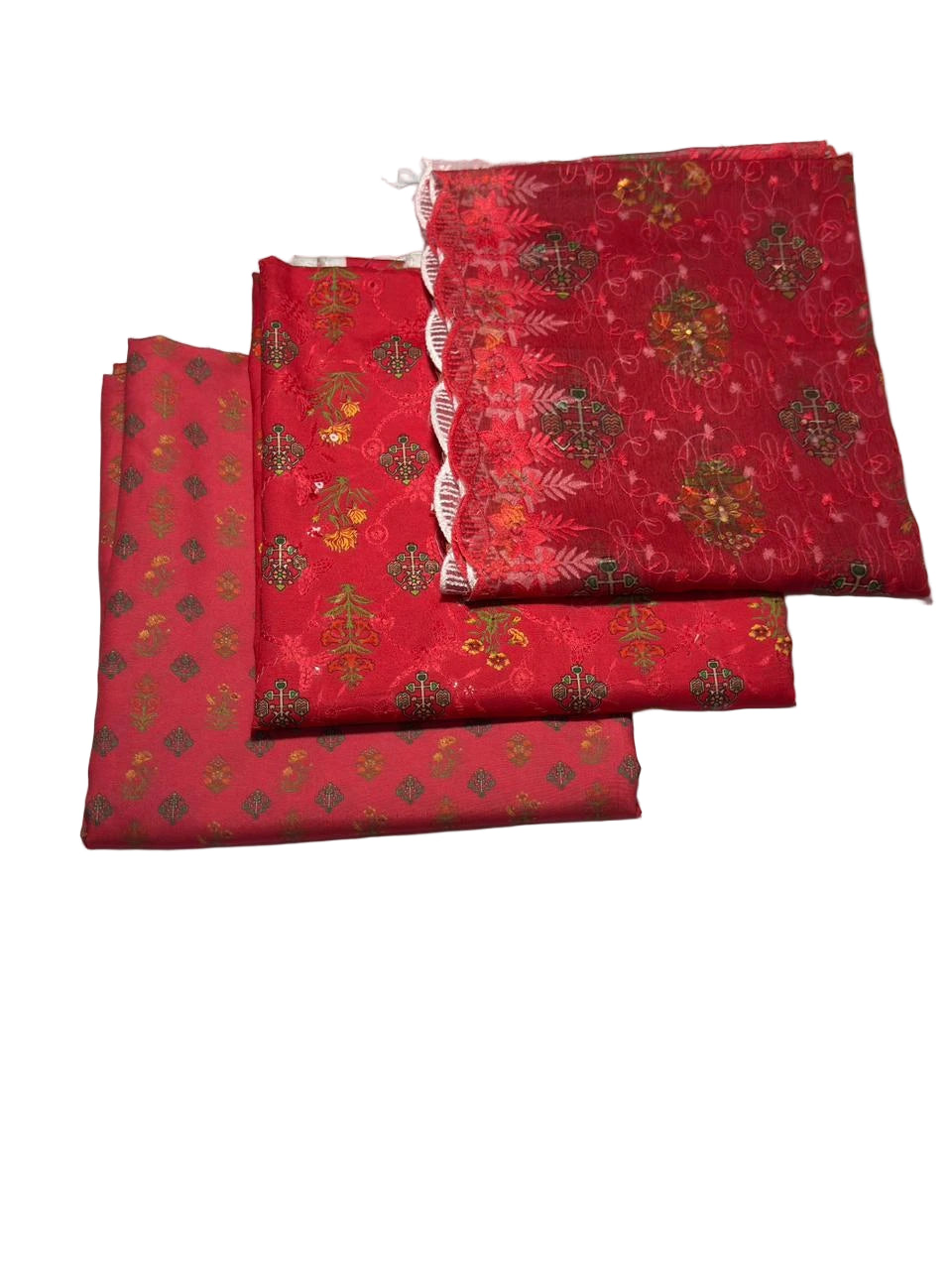 Red fabric with gold patterns on a white background