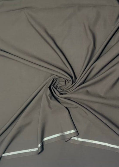 Dark gray fabric with a subtle texture and a visible brand logo on a plain background