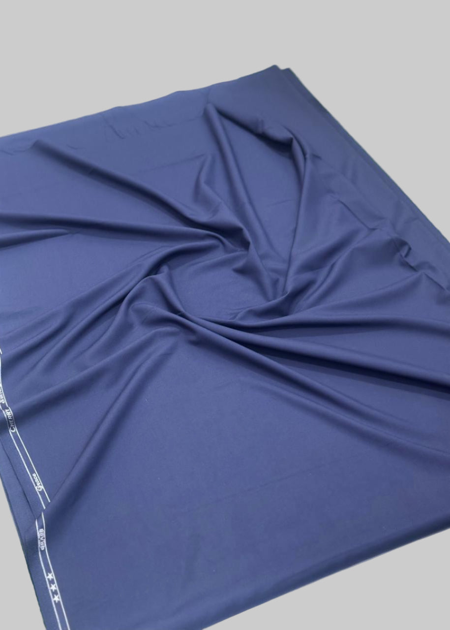 Blue fabric with a subtle pattern on a gray background