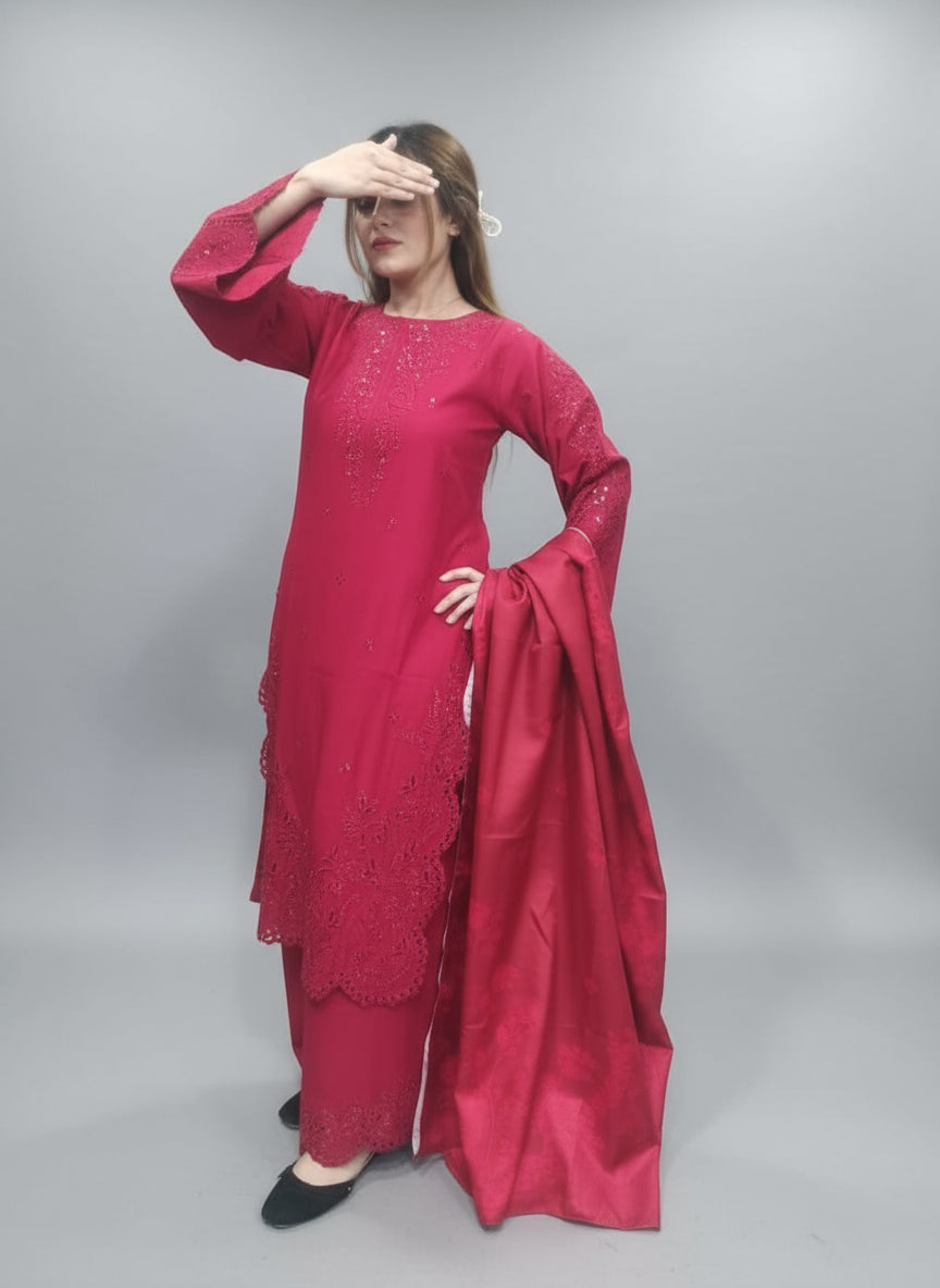 A Girl wearing a red traditional outfit with a green background