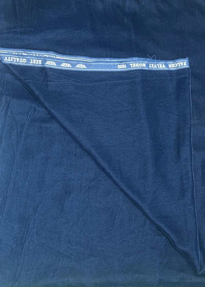 Blue fabric with white label on a blue background