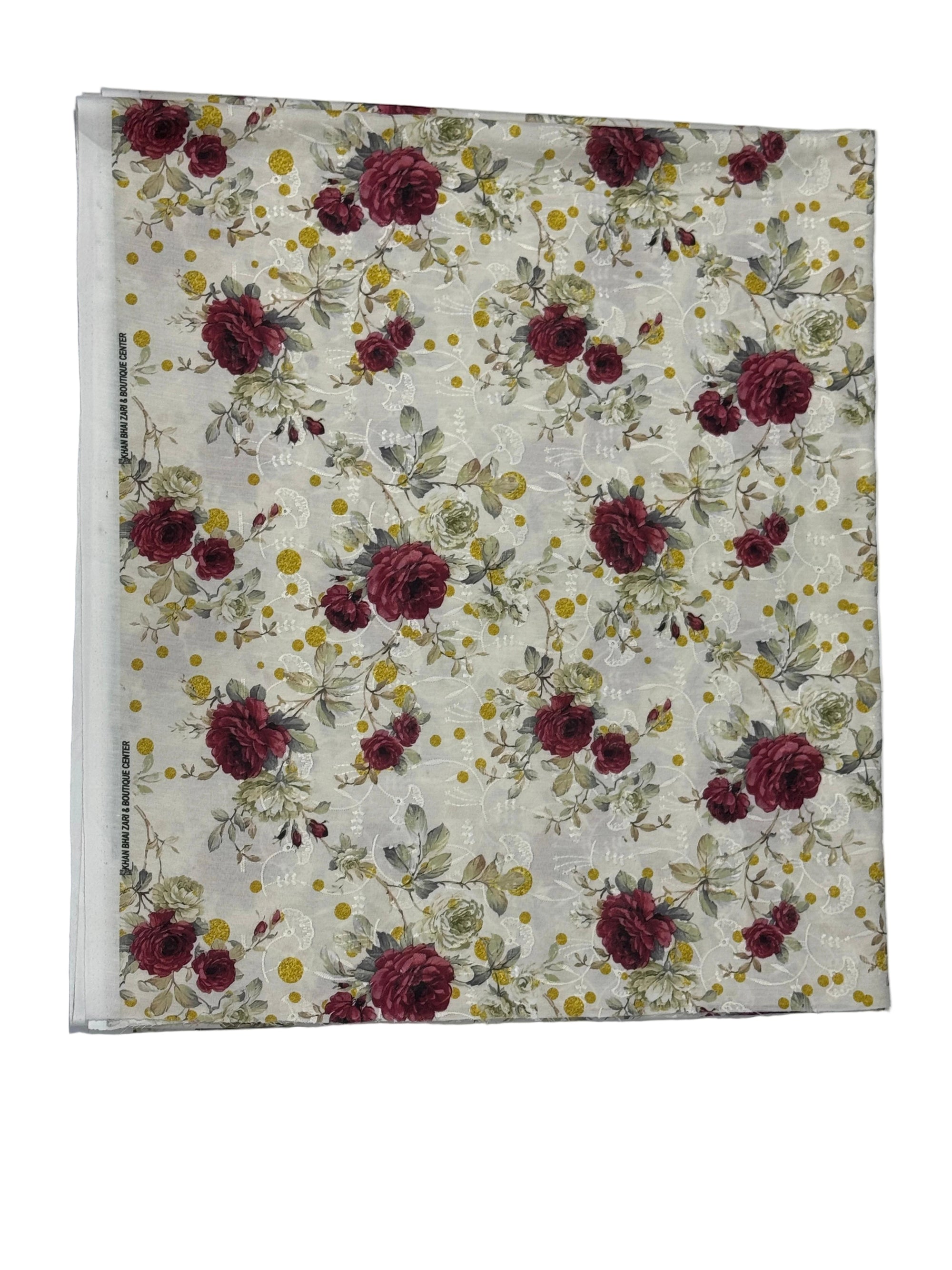 Floral patterned fabric with red roses and yellow flowers on a white background
