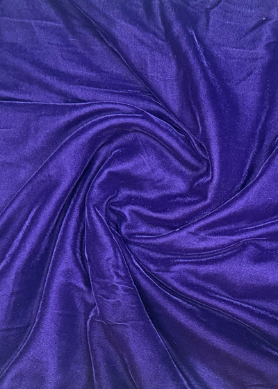 Close-up of purple fabric with folds