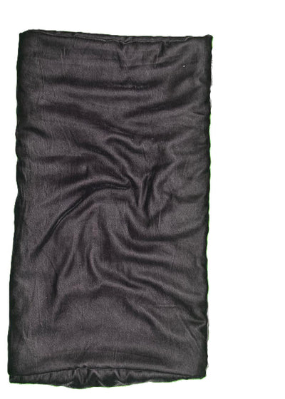 Folded black fabric on a white background