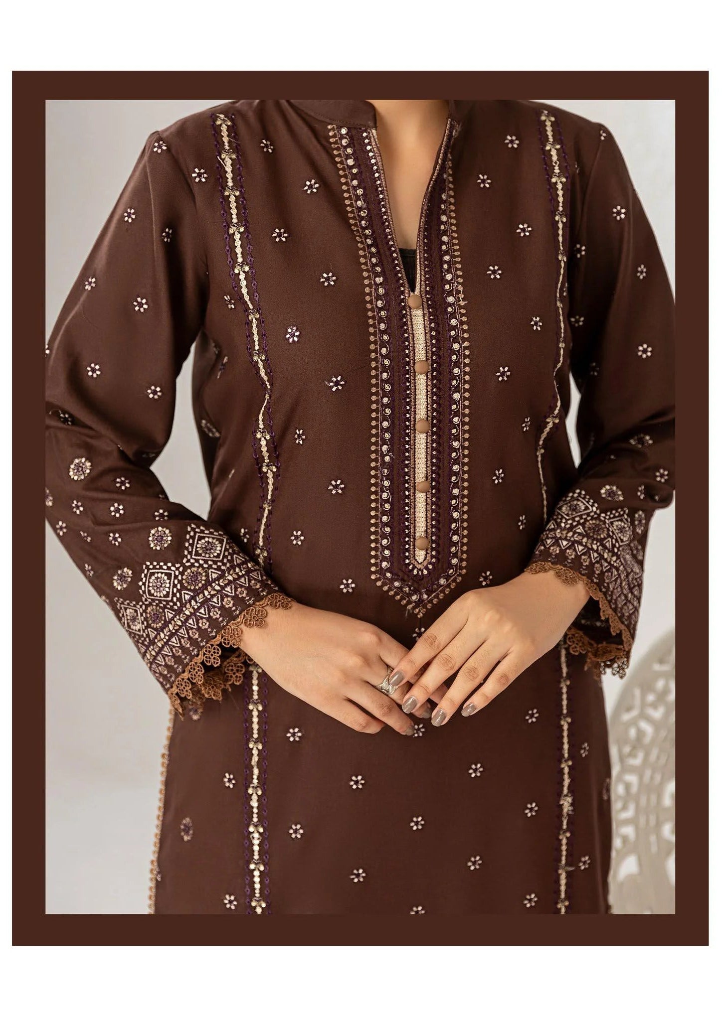 Brown embroidered outfit with matching dupatta on a white background