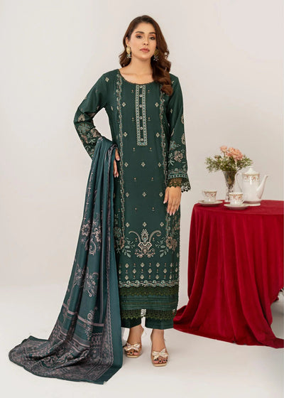 Woman modeling a green embroidered outfit with a red tablecloth and flowers in the background